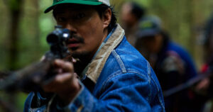 personagem Sung Ki com um rifle em hope